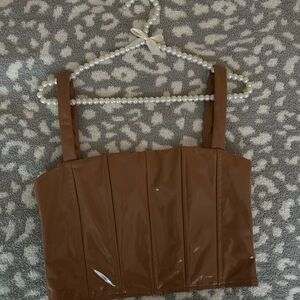 SOLD

Worn once leather cropped top